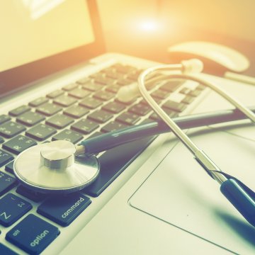 stethoscope on laptop checking diagnosing pc sick clean utility software tech cleanup